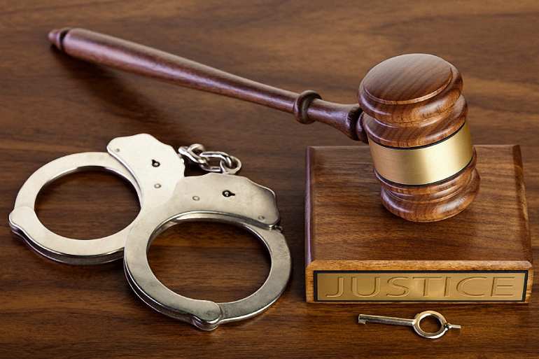 gavel handcuffs sent to jail