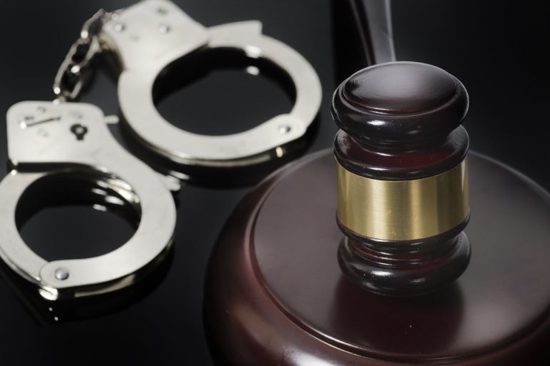 handcuffs sentenced to jail