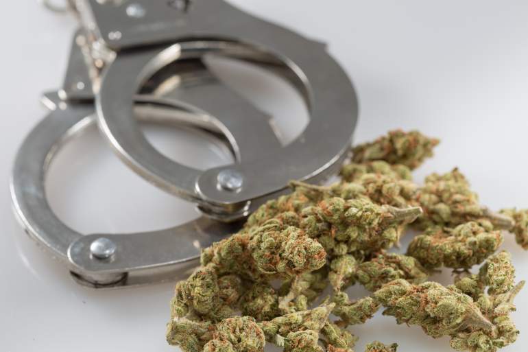 marijuana handcuffs arrested